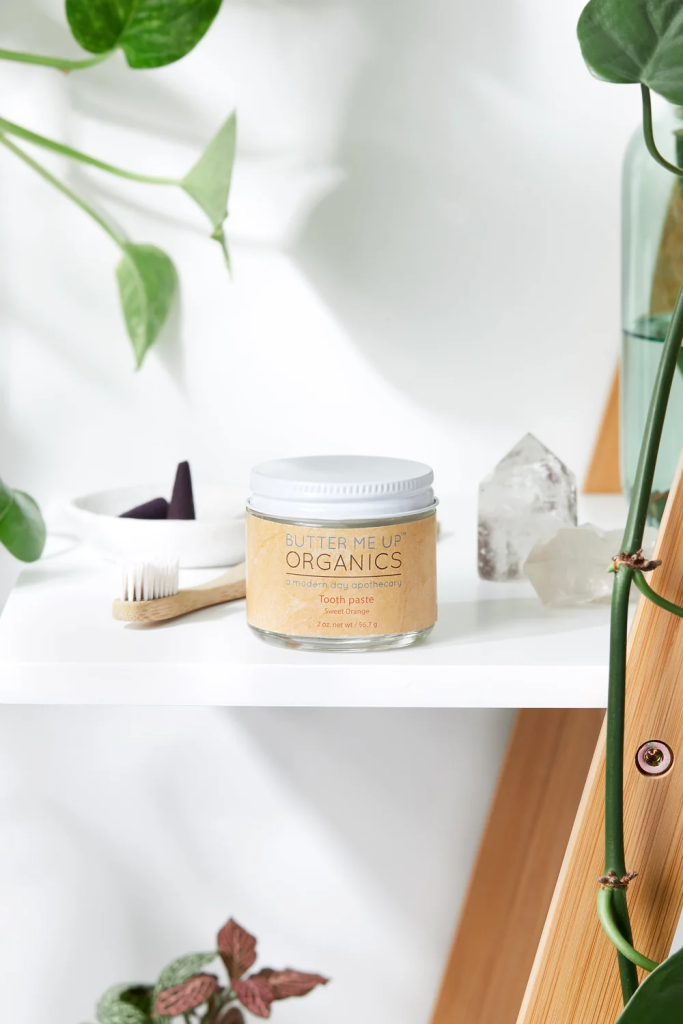 Butter Me Up Organics toothpaste in a reusable glass jar